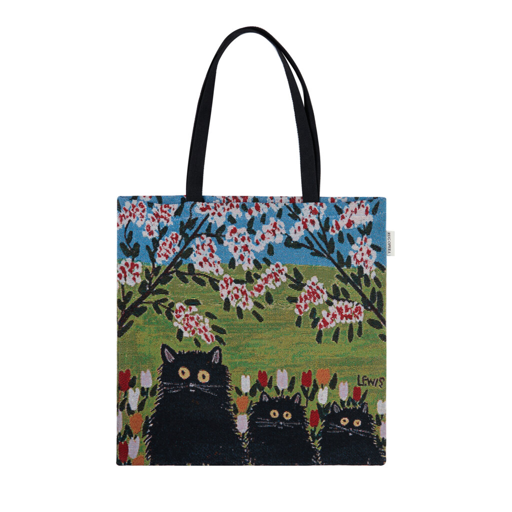 High-end woven tapestry tote bag by Rug Opera, featuring the Nocturne Orchard design with three majestic black cats in a vibrant folk art meadow inspired by Maud Lewis.