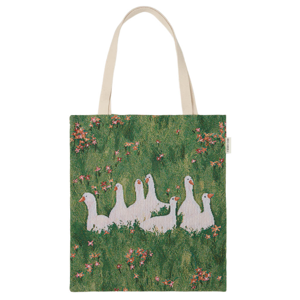 Meadow Muse luxury woven tapestry geese tote bag with cream shoulder straps and green meadow wildflower design by Rug Opera